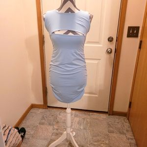 New in bag.  Light blue dress Size M